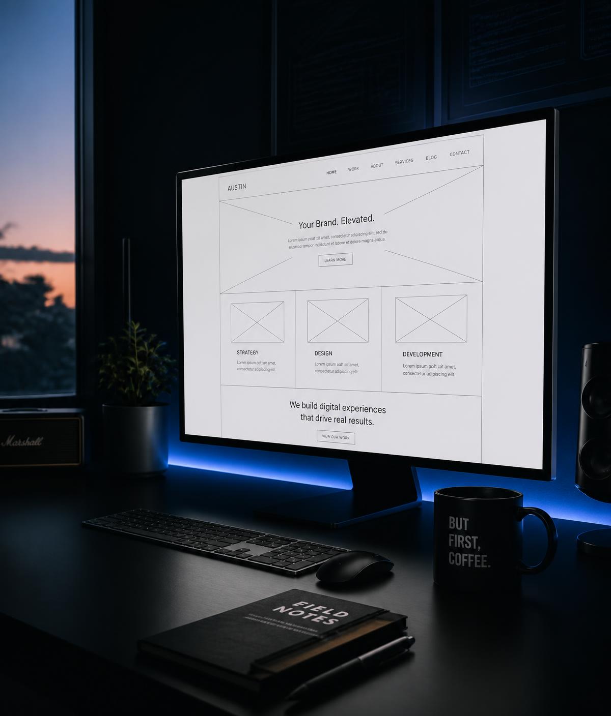 The DET Digital studio desk with a website wireframe on screen